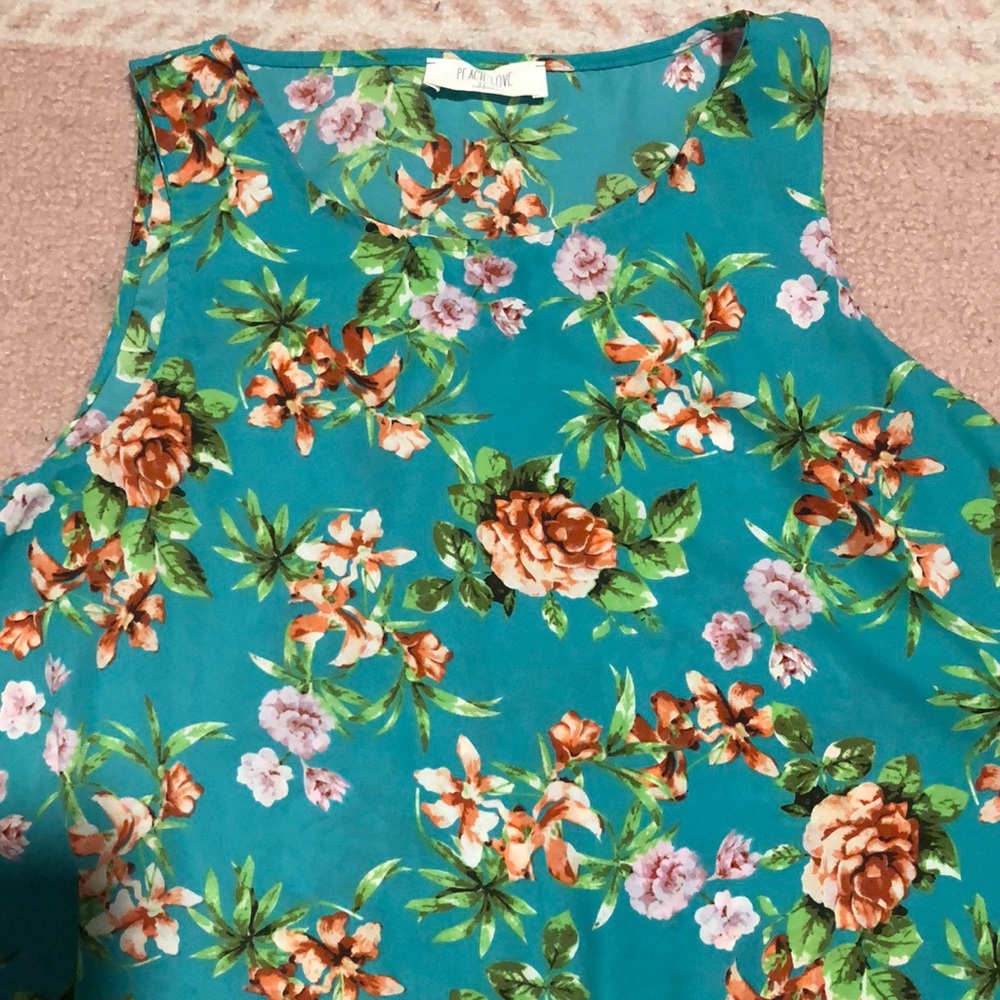 Sleeveless teal floral crop top